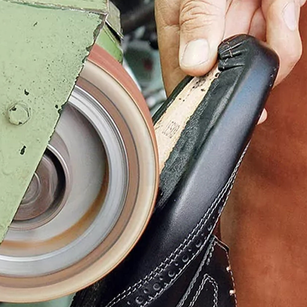 How our shoes are made - image of a shoe sole being sanded