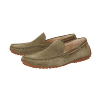 Side view of a pair of green calf suede Callimo moccasin for men showing distinctive color blocking and lightweight rubber sole curved at the heel ideal for car drivers