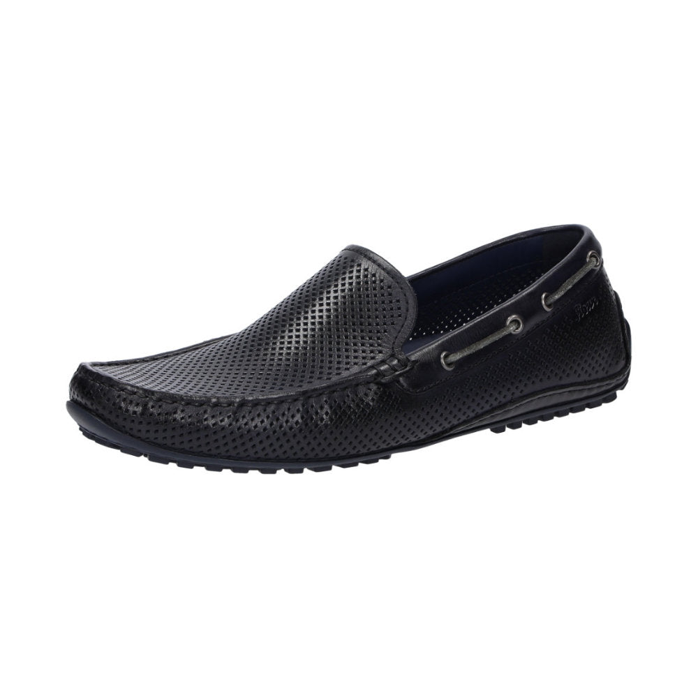 Side view of Carulio navy perforated calf leather driving moccasin for men featuring black pedal-gripping sole curved up at the heel ideal for car drivers
