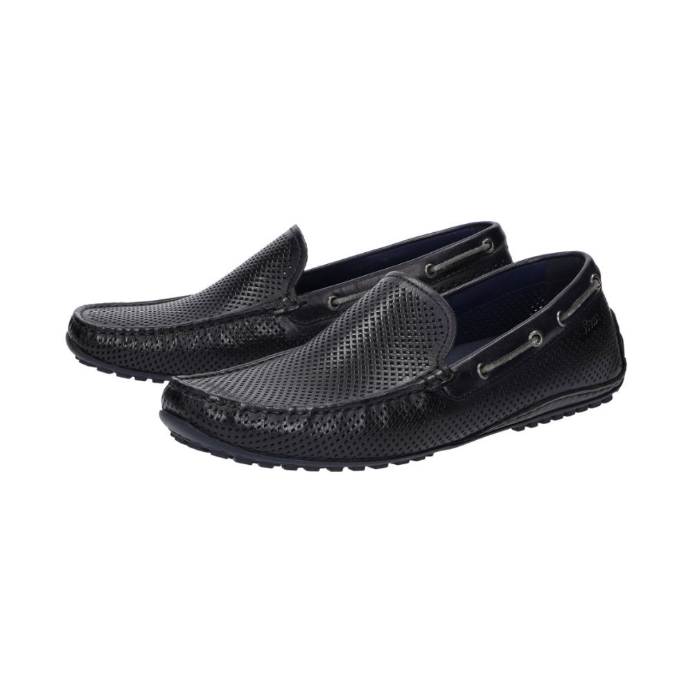 Side view of a pair of Carulio navy perforated calf leather driving moccasin for men featuring black pedal-gripping sole curved up at the heel ideal for car drivers