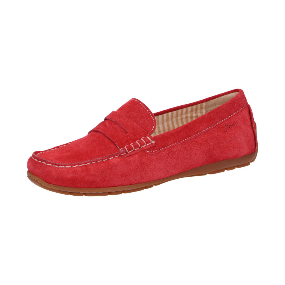 Side view of Carmona women's penny loafer / moccasin in red calf suede with detail of quality craftsmanship