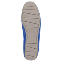 View from the bottom of the Carmona women's penny loafer / moccasin in electric blue calf suede highlighting it's flat and soft rubber sole, which curves up at the heel, making it ideal for driving