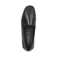 Bottom view of Black Cortizia women's loafer shoe on a white background showing high grip rubber black sole