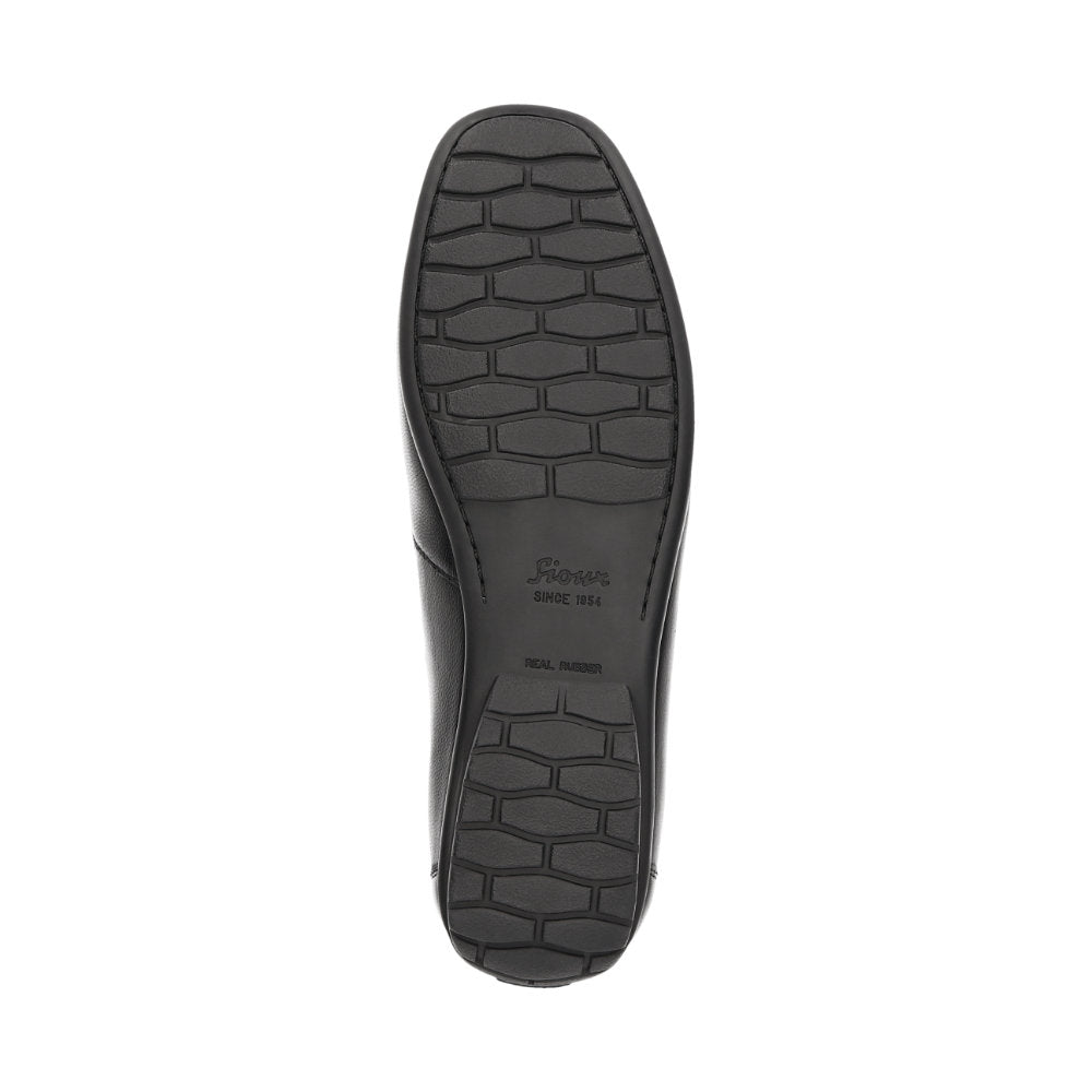 Outside view of Black Cortizia women's loafer shoe on a white background showing metal snaffle trim, rubber black sole and Nappa