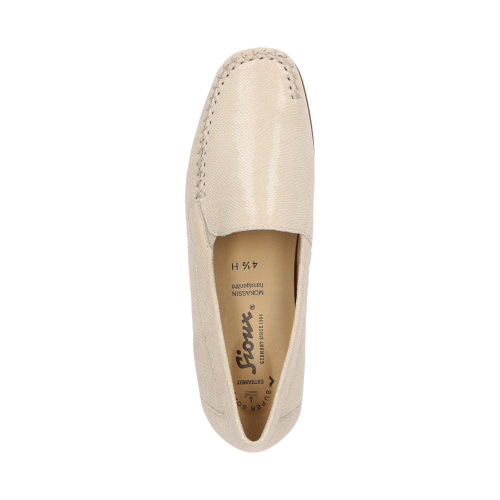 Bottom view of Cream Cortizia women's loafer shoe on a white background showing high grip rubber black sole
