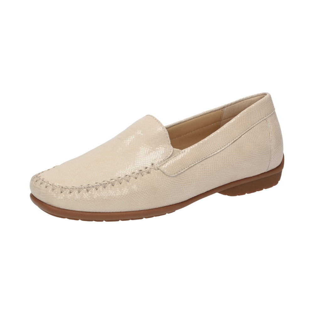 Pair of Cream Cortizia women's loafer shoe on a white background showing metal snaffle trim, rubber black sole and Nappa