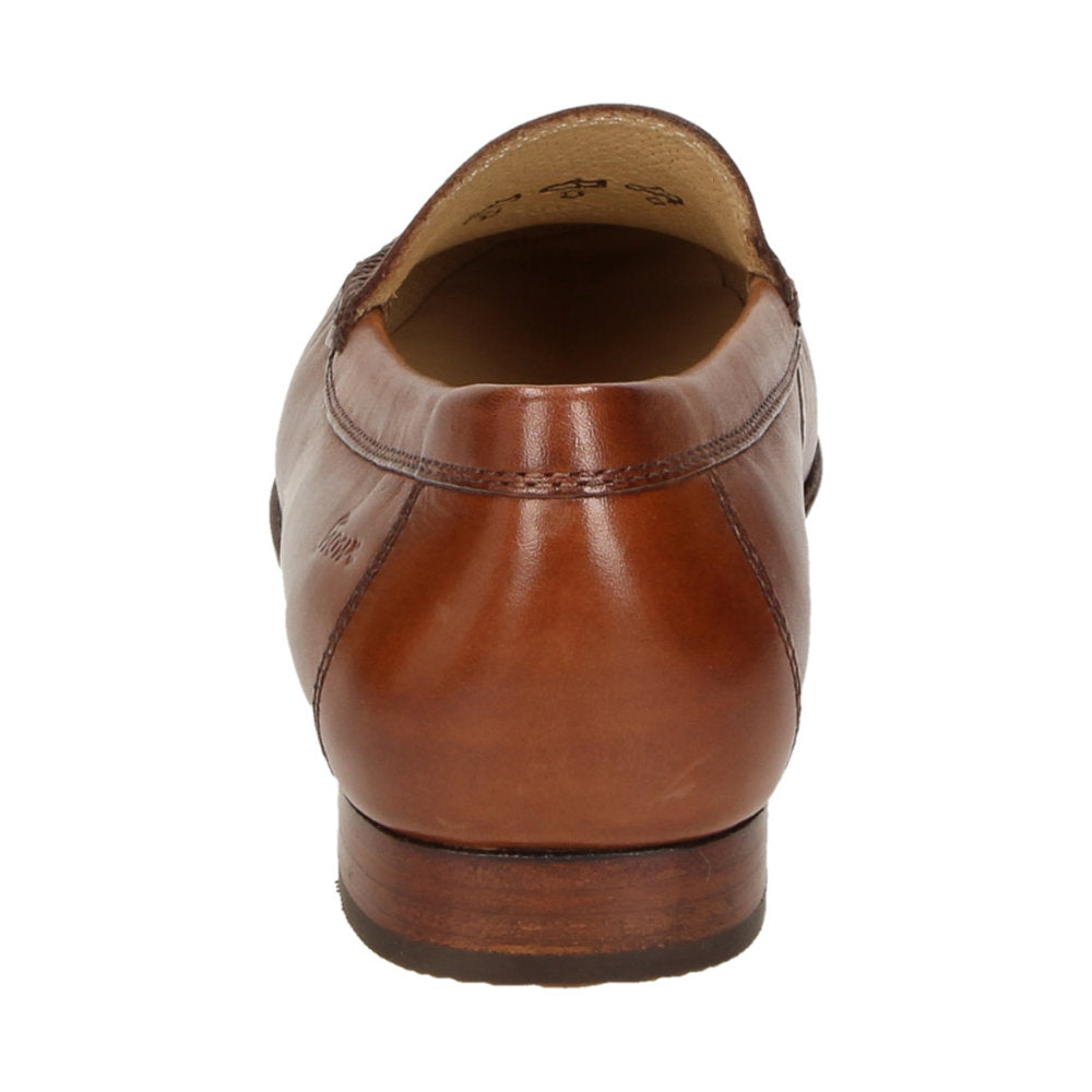 Side profile of brown Campina showing classic moccasin design