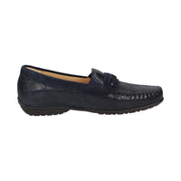 Inside view of navy blue Cortizia women's loafer shoe on a white background showing snaffle trim, rubber black sole and snake-embossed kid leather H width