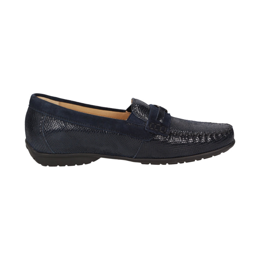 Inside view of navy blue Cortizia women's loafer shoe on a white background showing snaffle trim, rubber black sole and snake-embossed kid leather H width